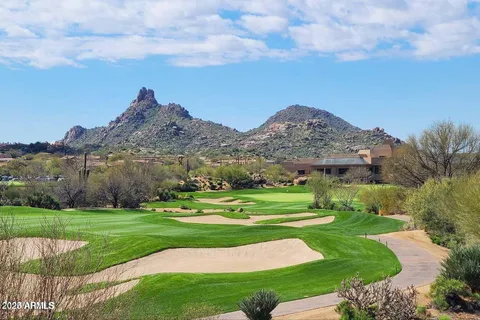 a view of snow on the road