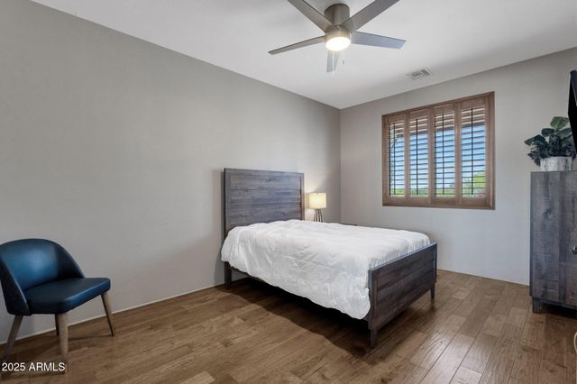 a living room with furniture and fireplace
