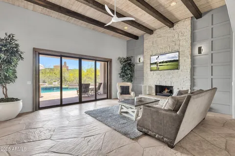 a living room with furniture and a table