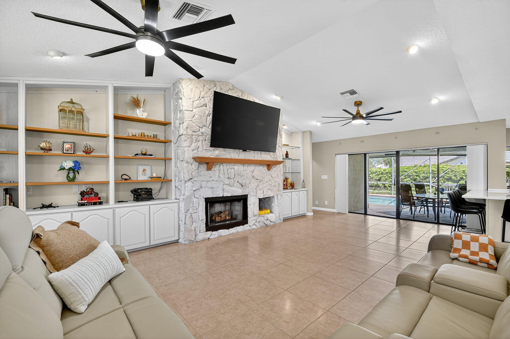 4270 Fox Trace Road Boynton Beach, FL 33436 - Photo 11 of 46 a living room with furniture fireplace and flat screen tv