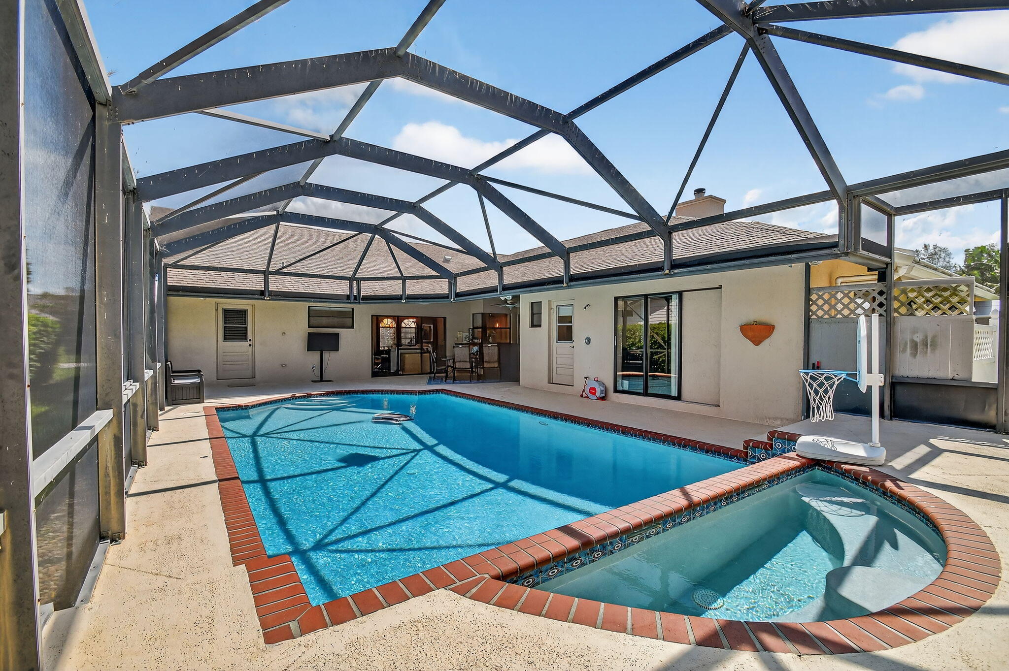 4270 Fox Trace Road Boynton Beach, FL 33436 - Photo 3 of 46 a view of swimming pool with a patio