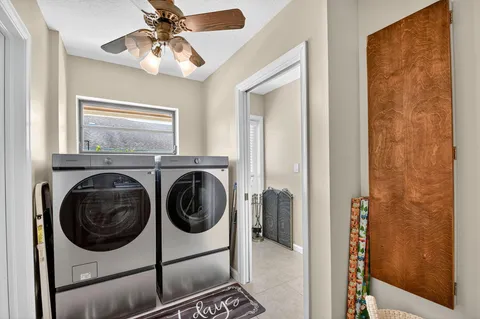 a utility room with dryer and washer