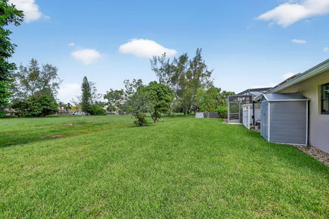 a view of a backyard with a garden