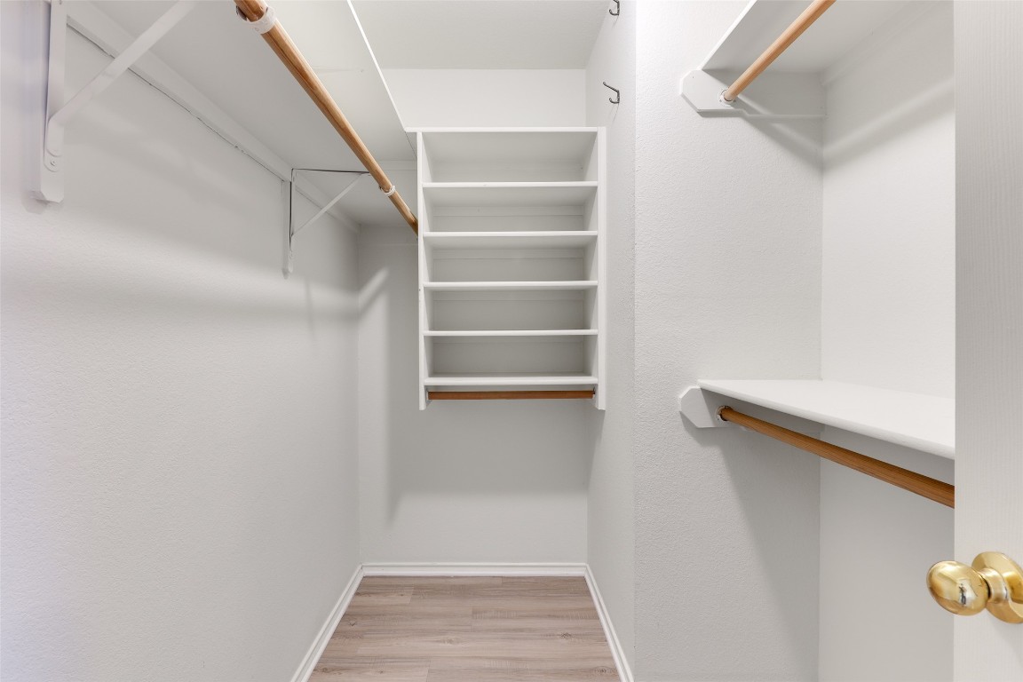 15437 Ozone Place Austin, TX 78728 - Photo 12 of 21 a view of an empty walk in closet