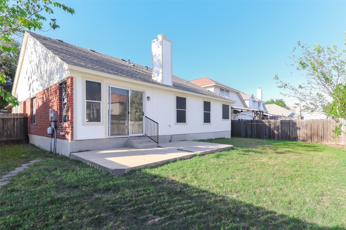 15437 Ozone Place Austin, TX 78728 - Photo 20 of 21 a view of a house with a yard and porch