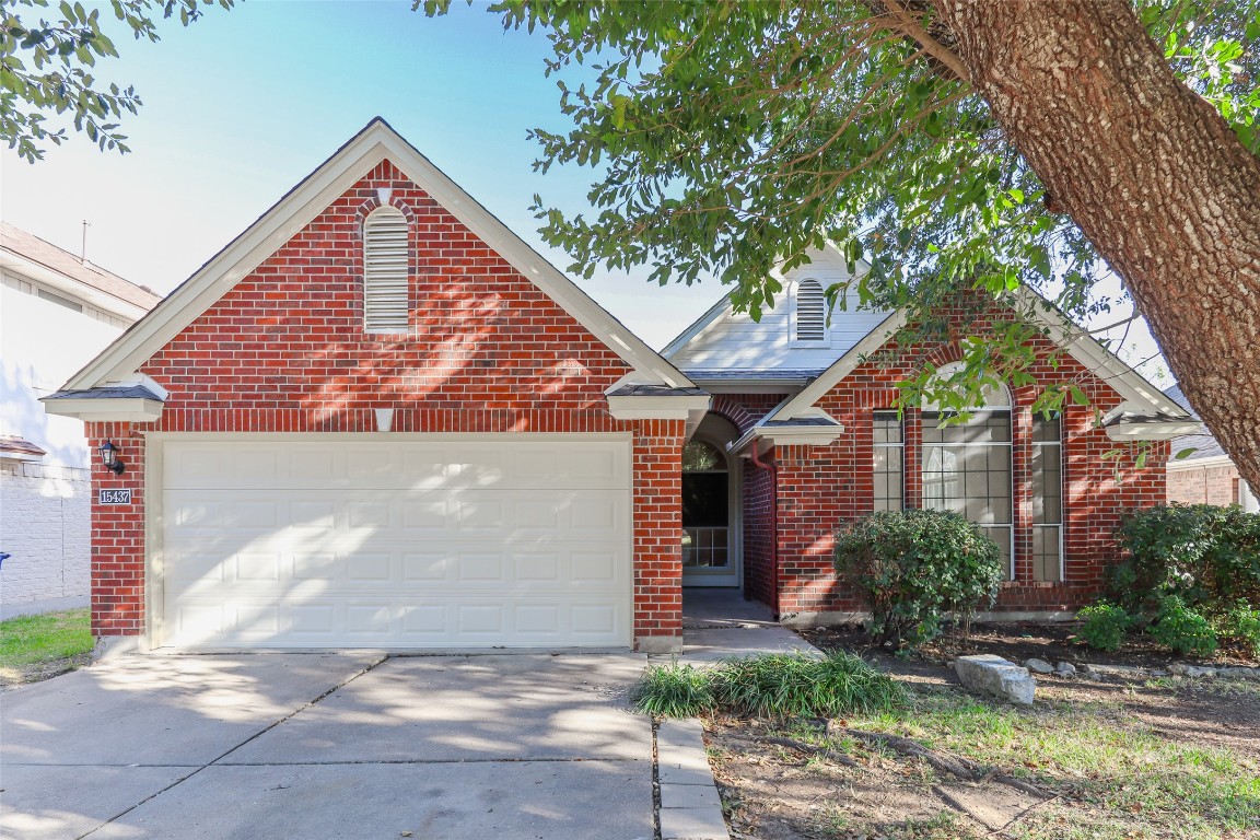15437 Ozone Place Austin, TX 78728 - Photo 2 of 21 a view of a house with a yard