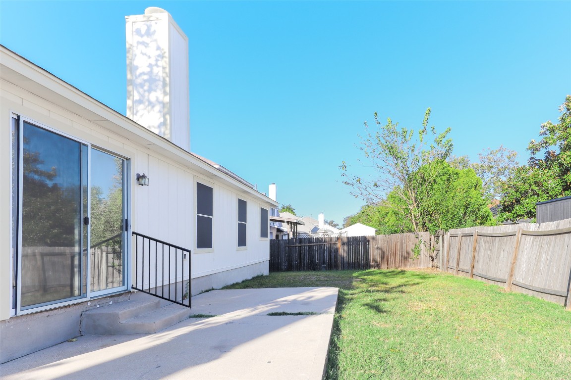15437 Ozone Place Austin, TX 78728 - Photo 21 of 21 a view of a porch with a small yard