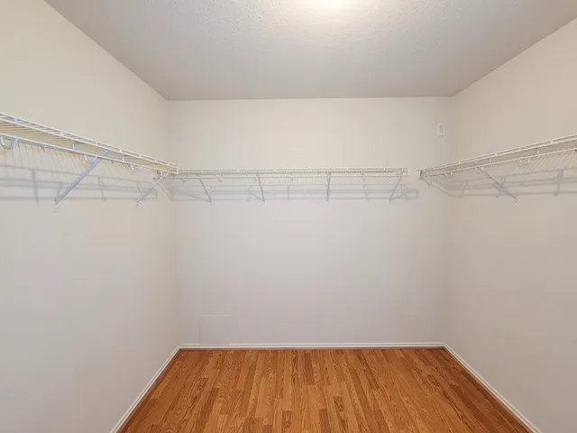a view of a room with racks on the wall