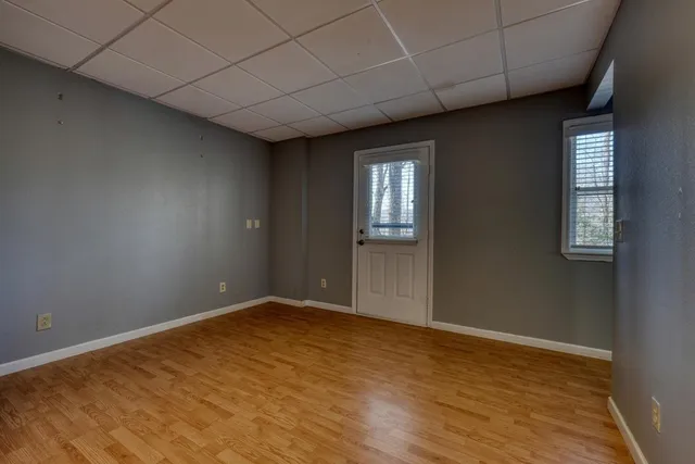a bathroom with a sink toilet and mirror