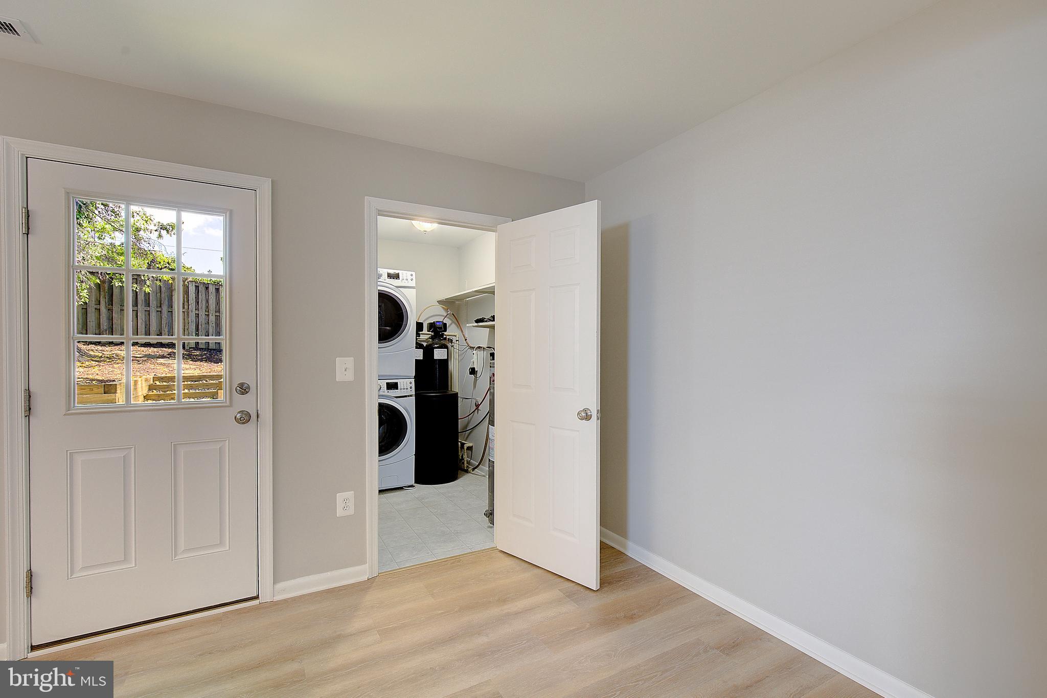 1739 Quantico Road Edgewater, MD 21037 - Photo 12 of 30 Washer/dryer off of kitchen/dining area