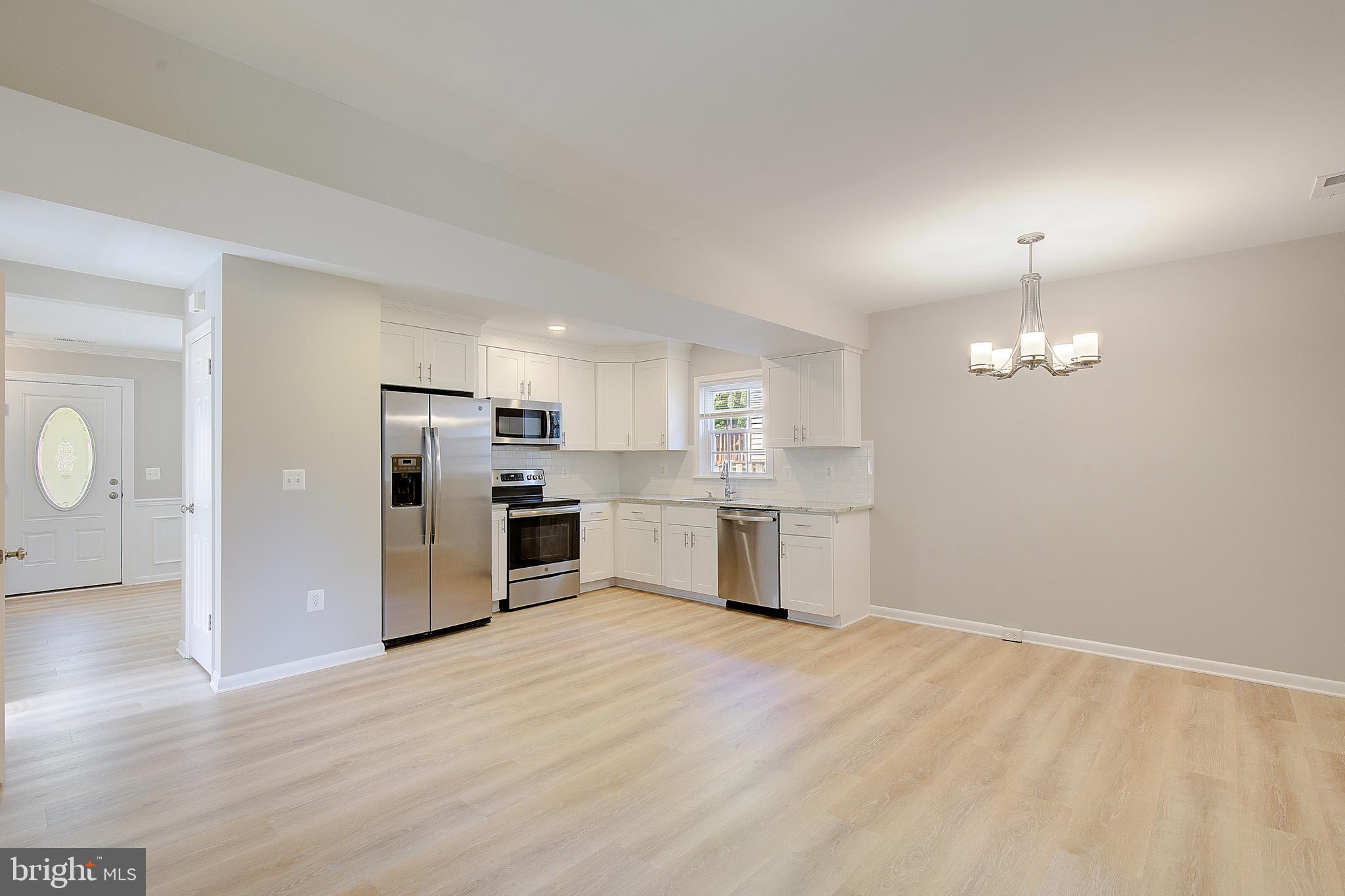 1739 Quantico Road Edgewater, MD 21037 - Photo 7 of 30 Airy kitchen and dining area
