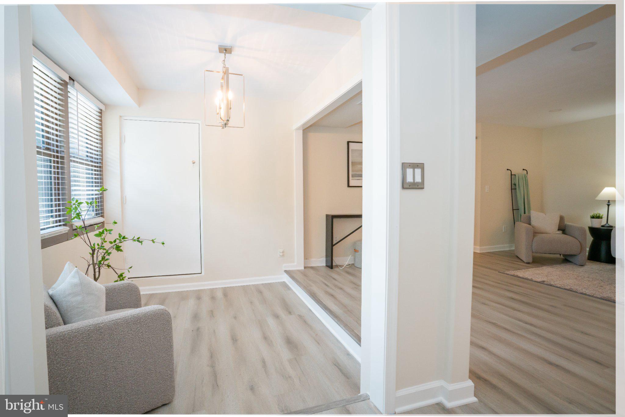 5860 Thunder Hill Road, Unit C1 Columbia, MD 21045 - Photo 2 of 22 Bright and inviting entryway space.