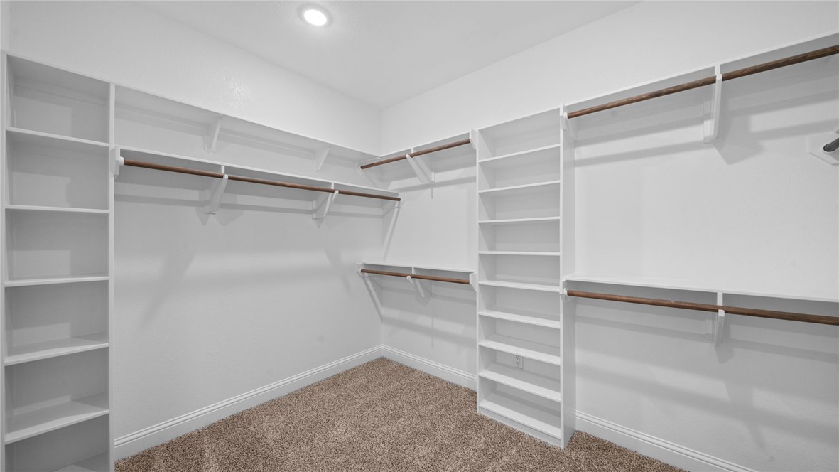 162 Buffalo Rdg Road Giddings, TX 78942 - Photo 17 of 31 a view of an empty walk in closet