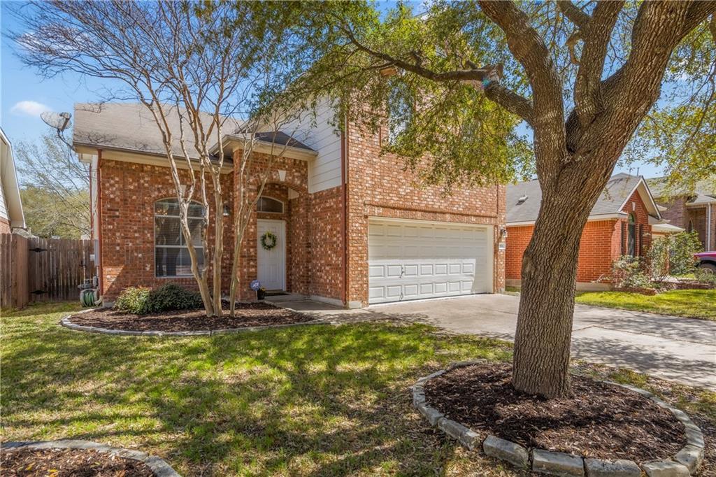 3508 Bratton Ridge Crossing Austin, TX 78728 - Photo 1 of 18 A classic brick exterior offers enduring charm with mature trees providing shade to the welcoming entrance.