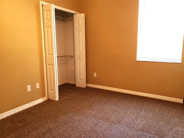 an empty room with a door