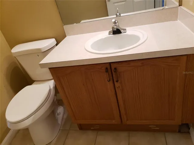 a bathroom with a sink and a toilet
