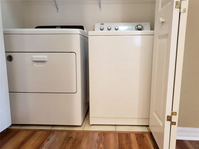 a utility room with dryer and washer