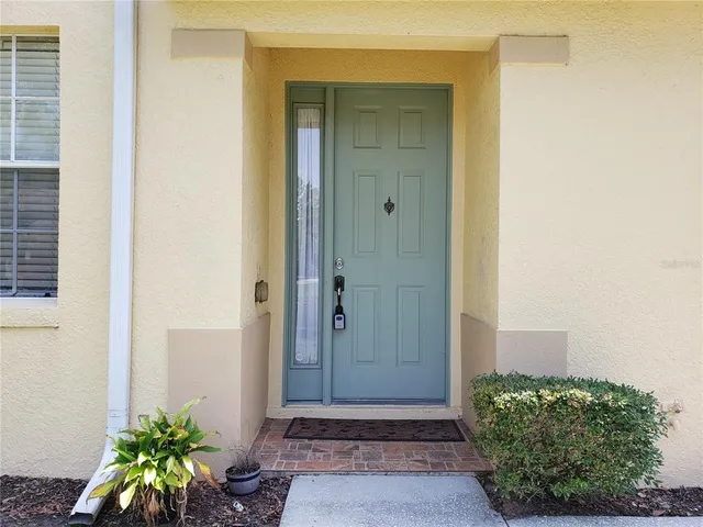 a view of a entryway door of the house