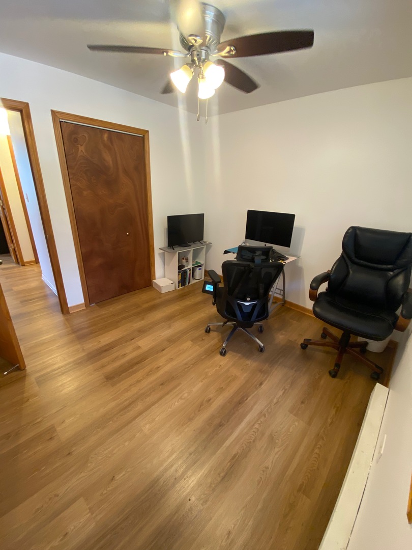 1927 Dugdale Road North Chicago, IL 60064 - Photo 11 of 36 a workspace with furniture and a window