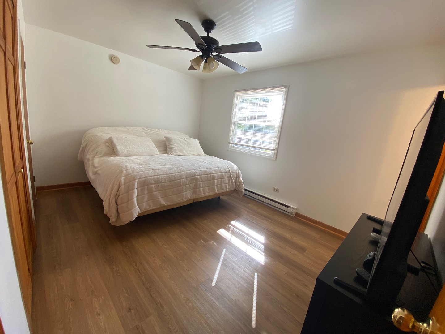 1927 Dugdale Road North Chicago, IL 60064 - Photo 13 of 36 a living room with bed furniture and a window