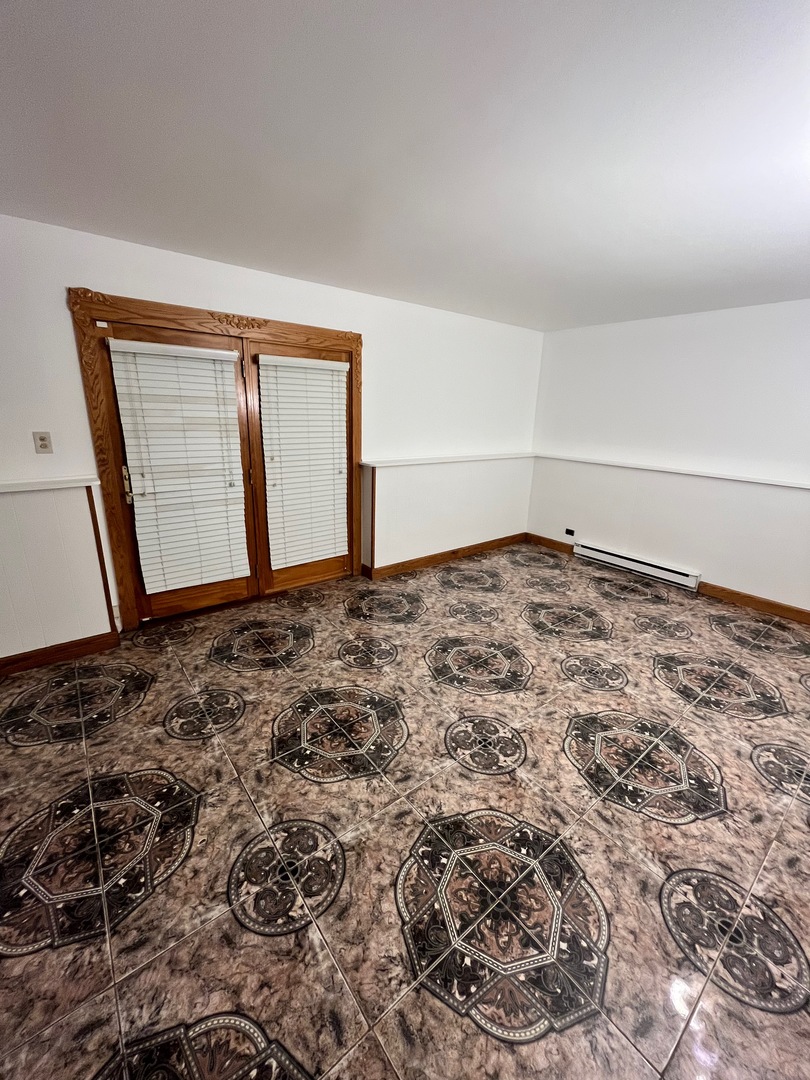 1927 Dugdale Road North Chicago, IL 60064 - Photo 21 of 36 a view of a room with window