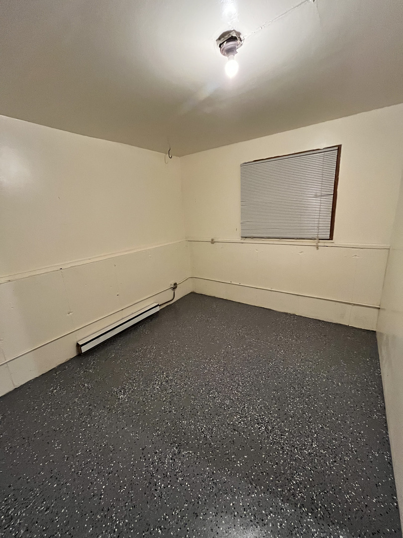 1927 Dugdale Road North Chicago, IL 60064 - Photo 25 of 36 a view of a room with an empty space