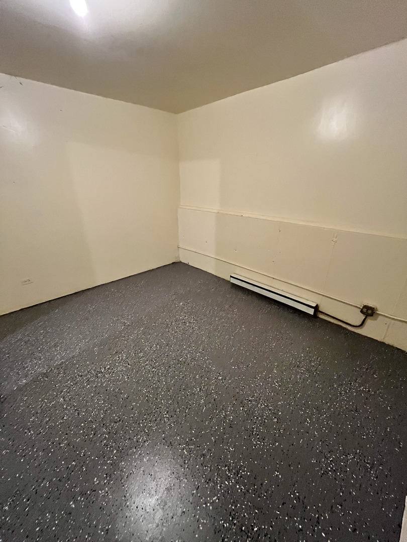 1927 Dugdale Road North Chicago, IL 60064 - Photo 26 of 36 a view of a room with an empty space