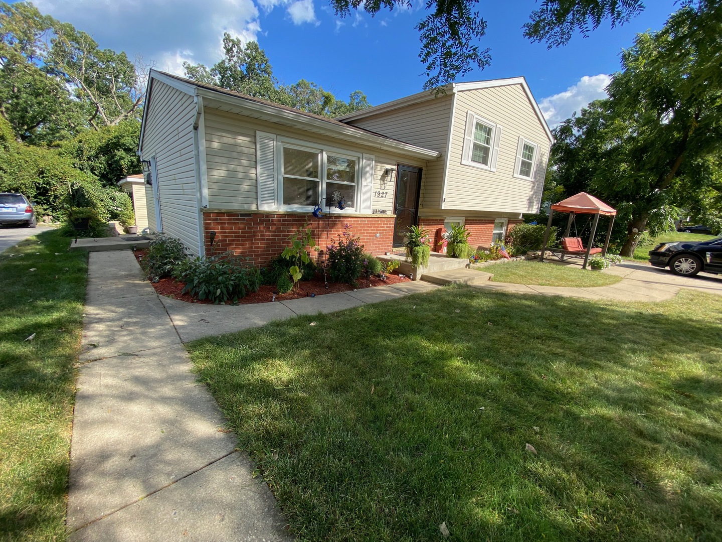 1927 Dugdale Road North Chicago, IL 60064 - Photo 3 of 36 a view of a house with backyard and sitting area