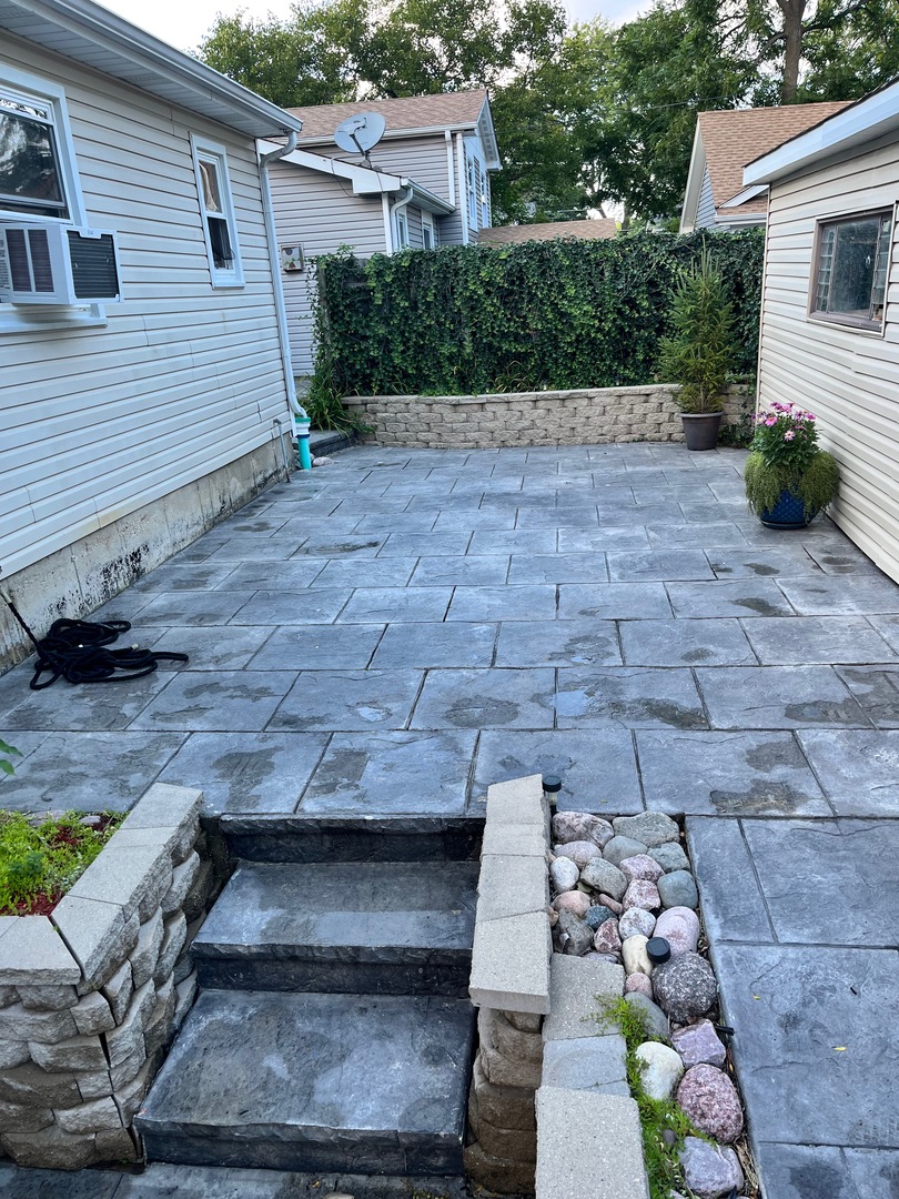 1927 Dugdale Road North Chicago, IL 60064 - Photo 33 of 36 a view of backyard with a patio
