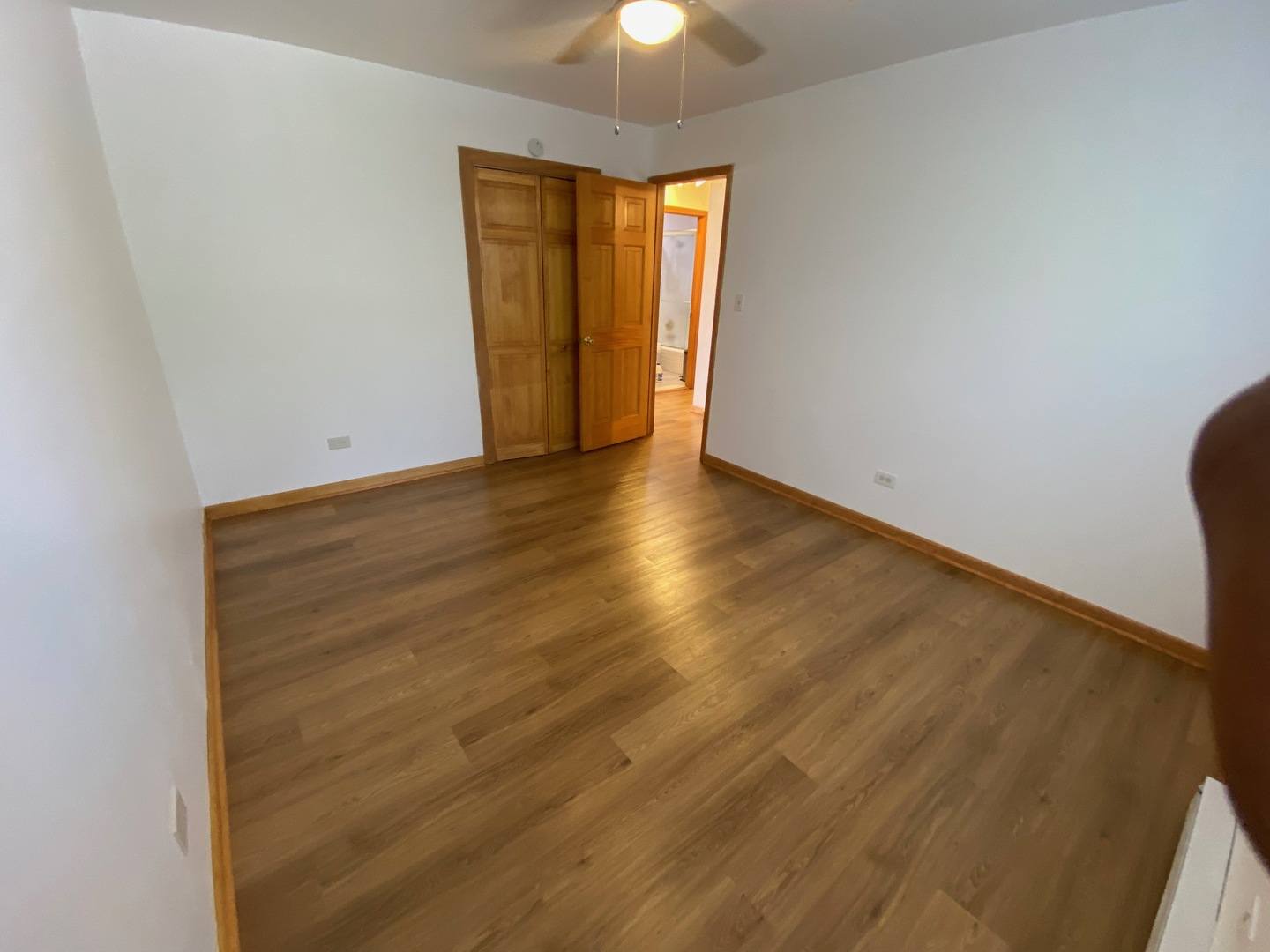 1927 Dugdale Road North Chicago, IL 60064 - Photo 10 of 36 wooden floor in an empty room