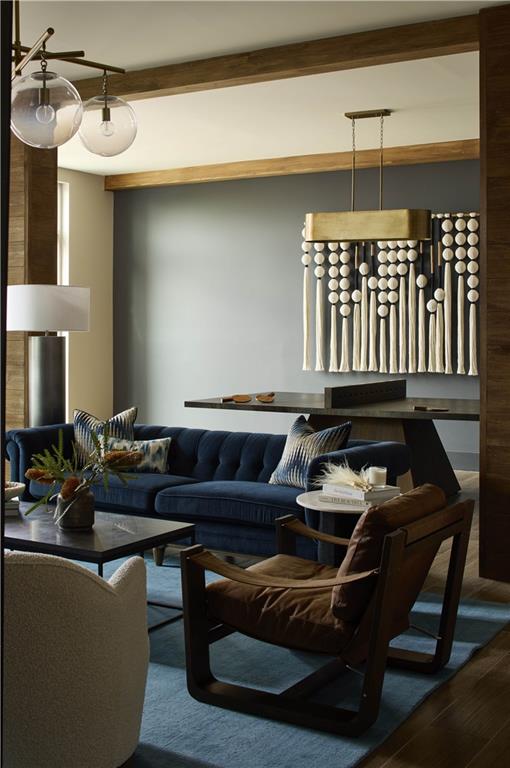 1809 Appaloosa Lane Northeast, Unit 3C Buford, GA 30519 - Photo 11 of 15 a living room with furniture a ceiling fan and a window