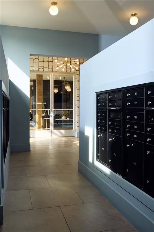 1809 Appaloosa Lane Northeast, Unit 3C Buford, GA 30519 - Photo 13 of 15 a lobby with furniture and a ceiling fan