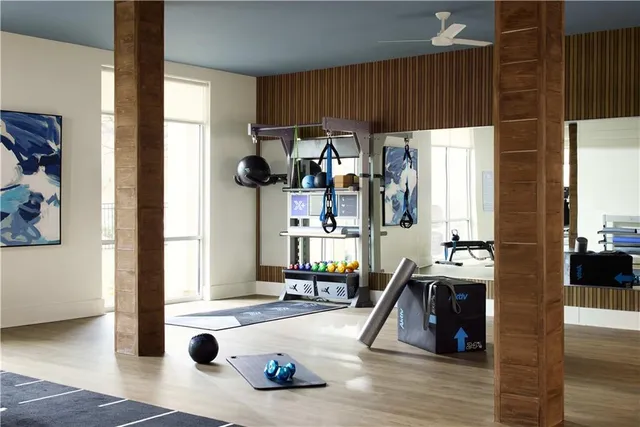 a view of living room with furniture and floor to ceiling window