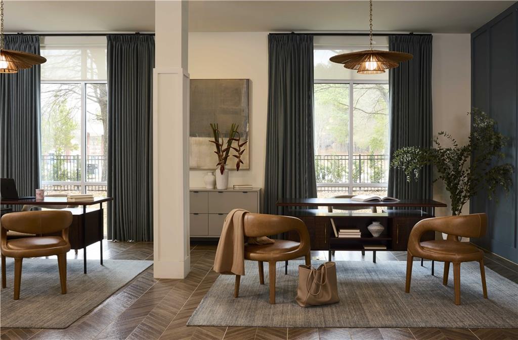 1809 Appaloosa Lane Northeast, Unit 3C Buford, GA 30519 - Photo 3 of 15 a living room with furniture and a window