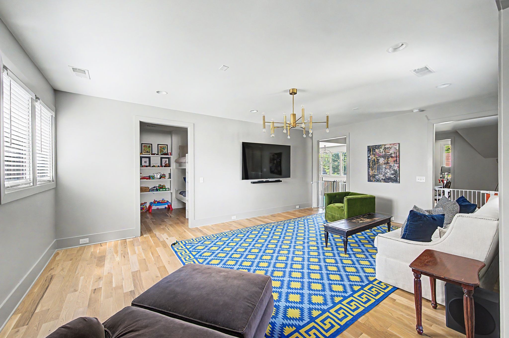 2825 Sugar Tree Road Nashville, TN 37215 - Photo 71 of 89 a bedroom with furniture and a wooden floor