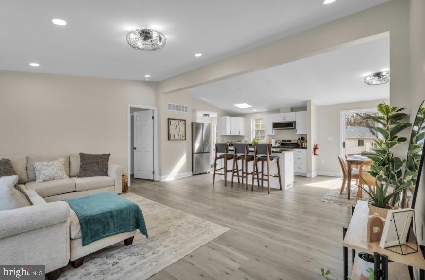 1230 Winslow Road Williamstown, NJ 08094 - Photo 17 of 34 a living room with furniture and wooden floor