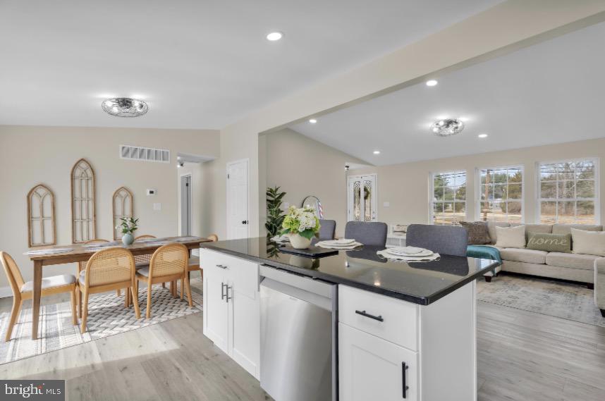 1230 Winslow Road Williamstown, NJ 08094 - Photo 19 of 34 a living room with furniture kitchen view and a large window