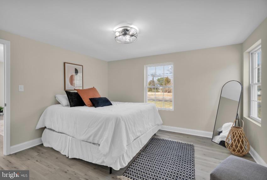 1230 Winslow Road Williamstown, NJ 08094 - Photo 22 of 34 a bedroom with a bed and a window