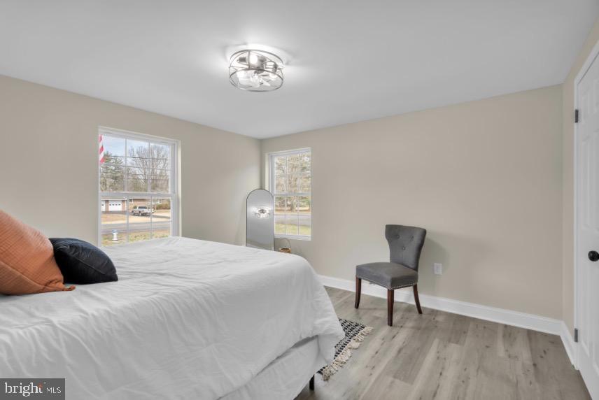 1230 Winslow Road Williamstown, NJ 08094 - Photo 23 of 34 a bedroom with a bed and a chair