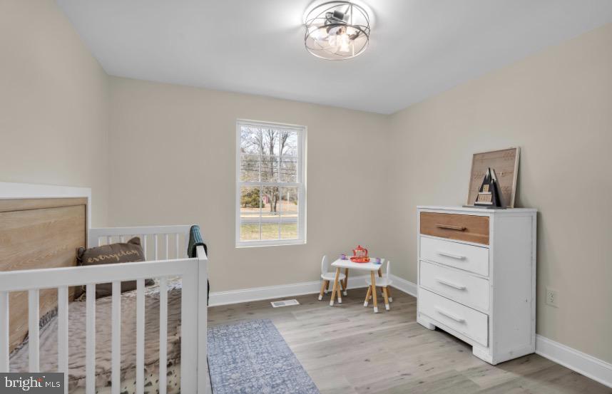 1230 Winslow Road Williamstown, NJ 08094 - Photo 26 of 34 a bedroom with furniture and a window