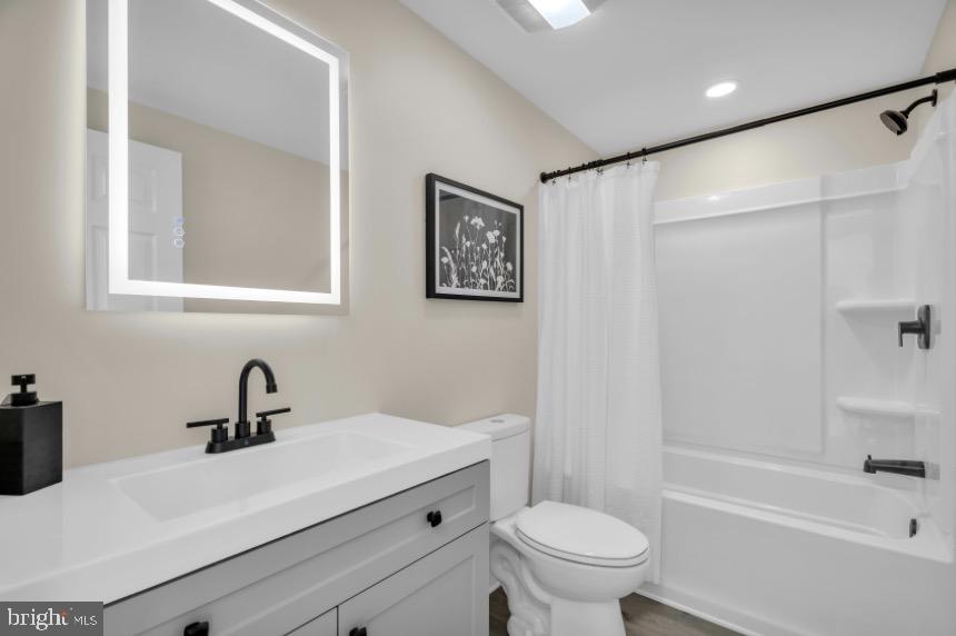 1230 Winslow Road Williamstown, NJ 08094 - Photo 27 of 34 a bathroom with a sink a toilet and a bathtub