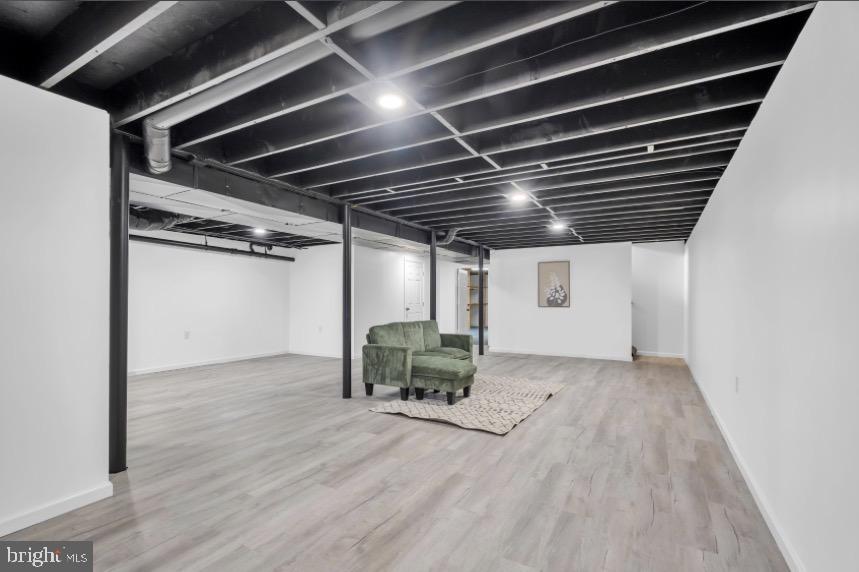 1230 Winslow Road Williamstown, NJ 08094 - Photo 28 of 34 a view of an empty room with wooden floor