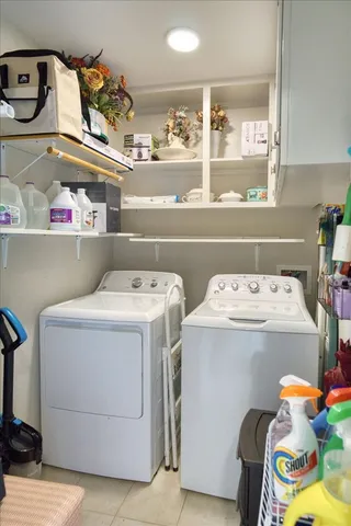 a utility room with dryer and washer