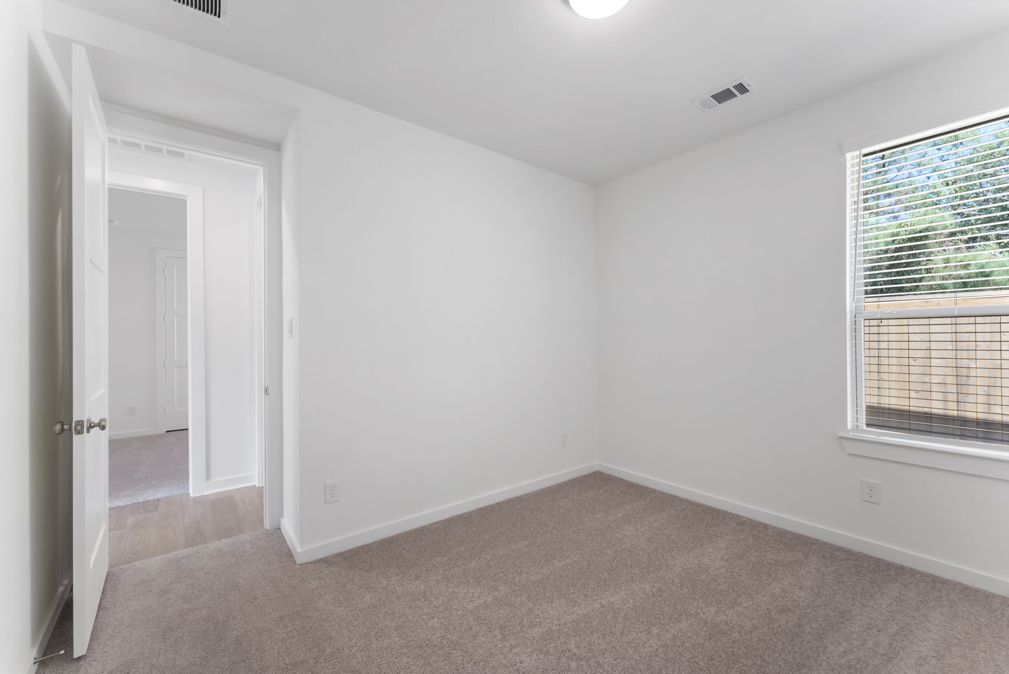 26383 Golden Pass Loop Montgomery, TX 77316 - Photo 25 of 40 an empty room with a window