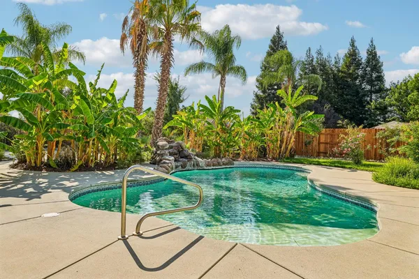a backyard of a house with lots of green space