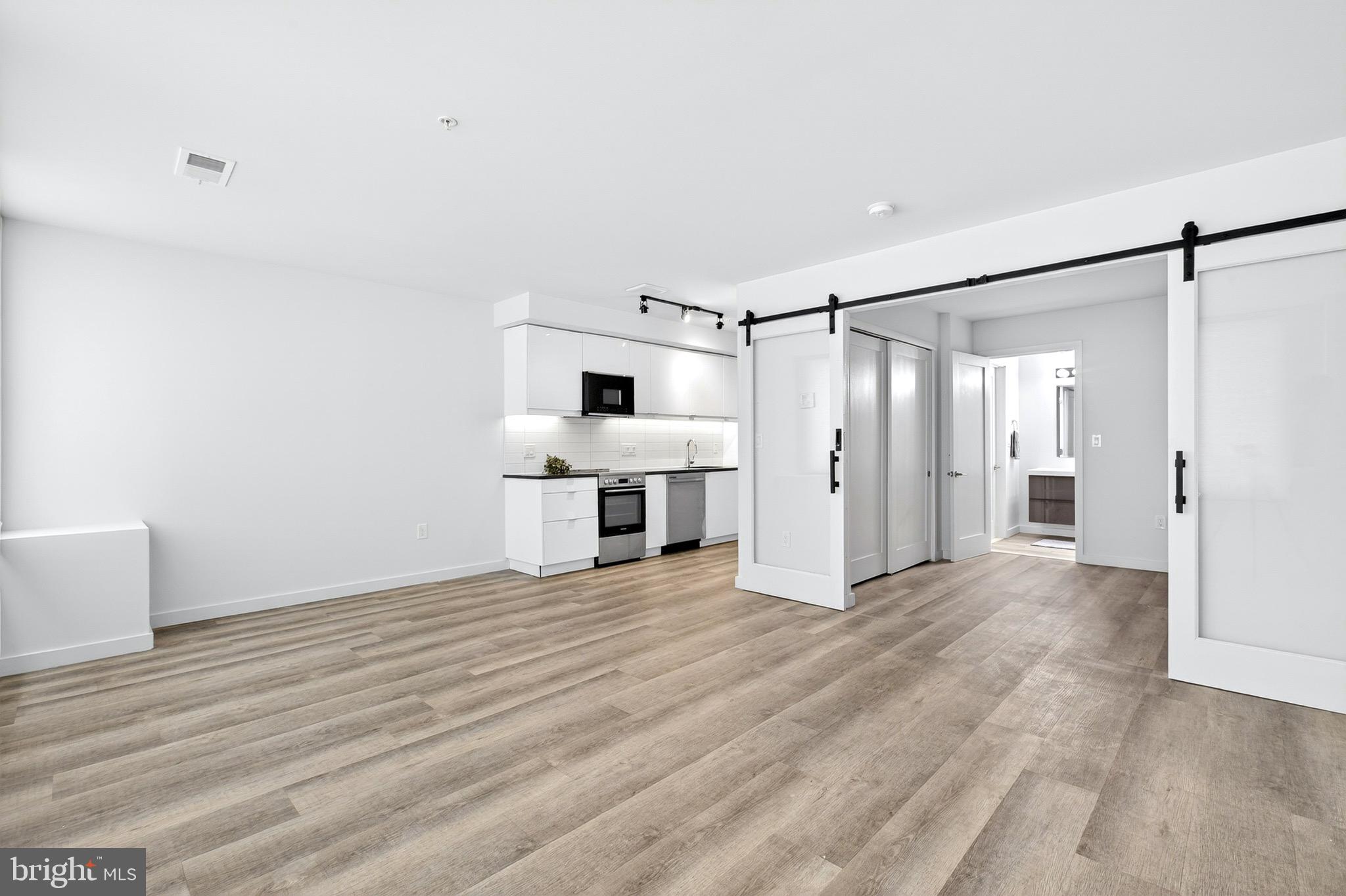 700 Roeder Road, Unit 104 Silver Spring, MD 20910 - Photo 14 of 15 Open Floorplan