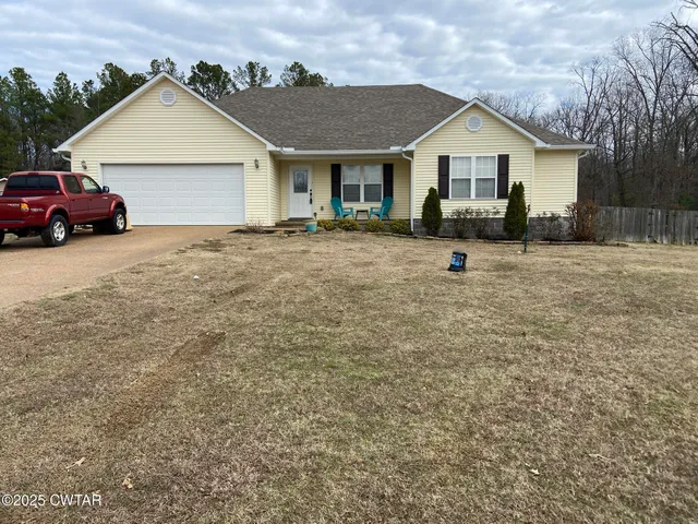 a view of a house with a patio