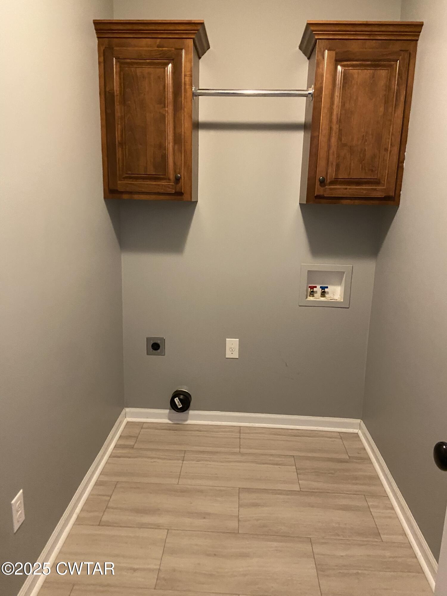 90 Timber Ridge Cove Henderson, TN 38340 - Photo 21 of 30 a view of a small space with wooden floor and cabinet