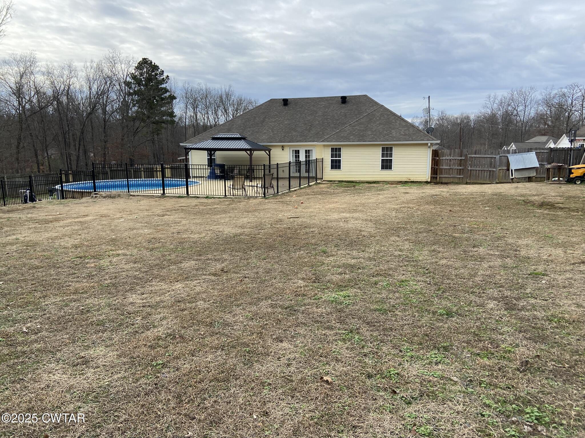 90 Timber Ridge Cove Henderson, TN 38340 - Photo 6 of 30 a front view of a house with garden