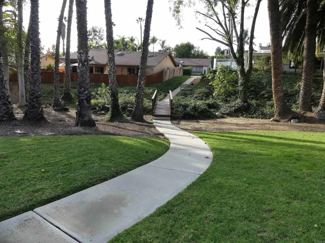 a view of backyard with green space
